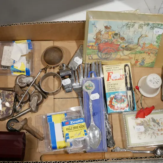 box; teaspoons, cards, small puzzles etc
