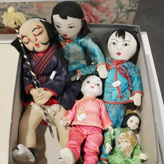 box of Asian dolls
