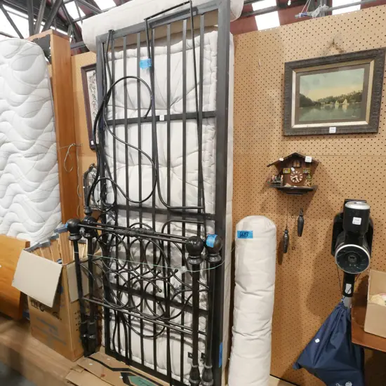 cast metal day bed with calico cushions, mattress and bolsters