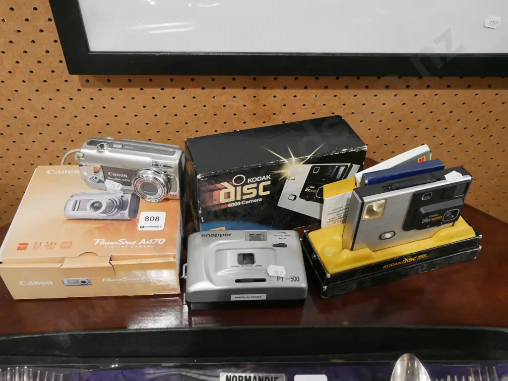 digital camera, 35mm camera, Kodak disc camera Image 1++
