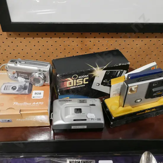 digital camera, 35mm camera, Kodak disc camera