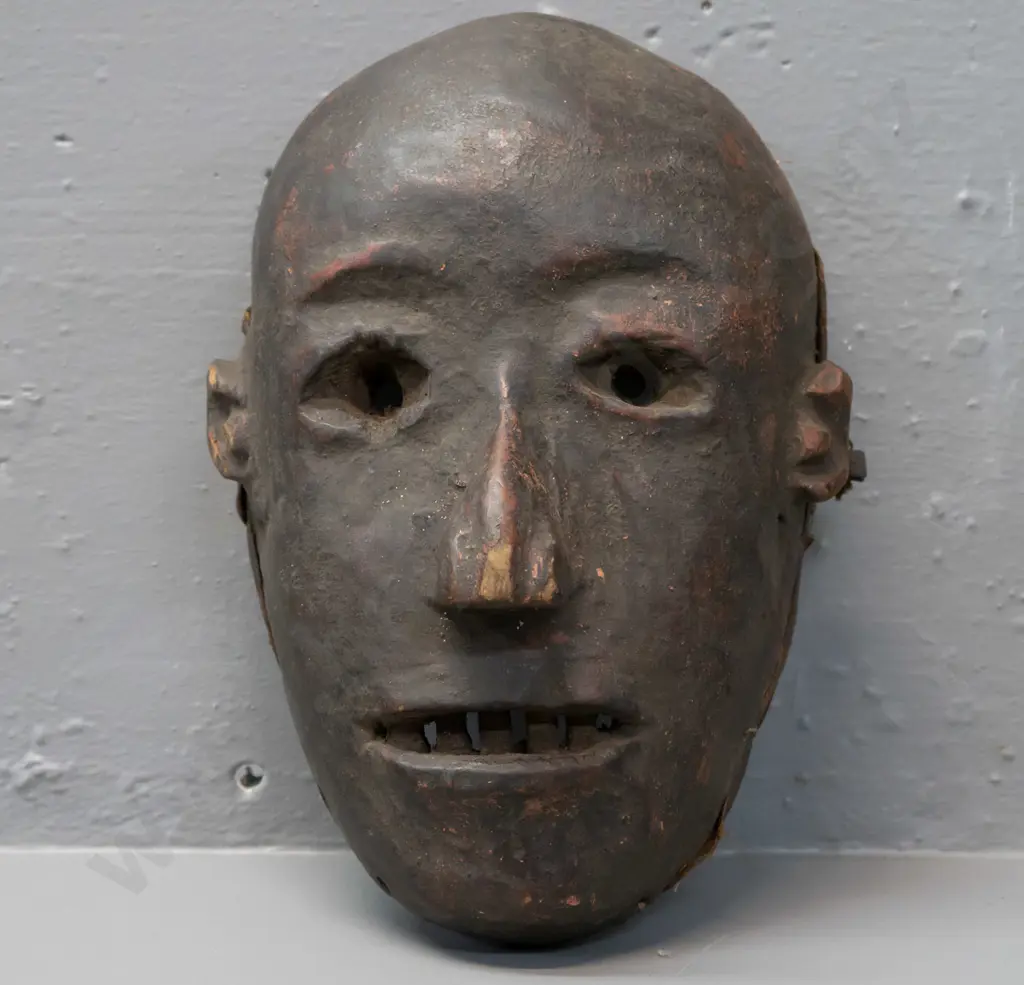 carved wood Fipa mask (Tanzania?) with earth pigment, remnant fabric liner around edge, has some chips H-230 W-170 Image 1++