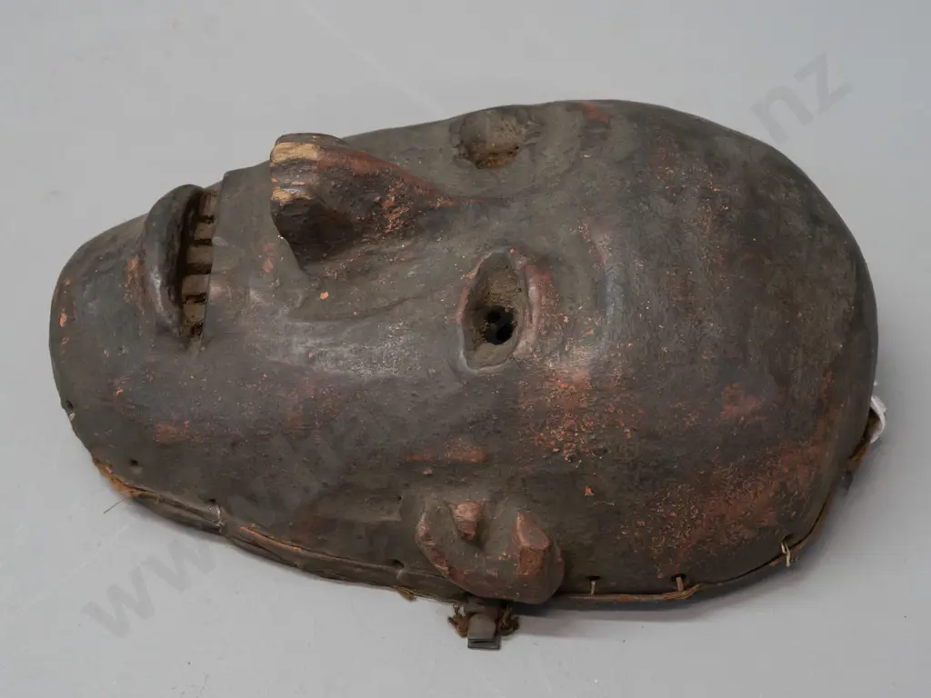 carved wood Fipa mask (Tanzania?) with earth pigment, remnant fabric liner around edge, has some chips H-230 W-170 Image 1++