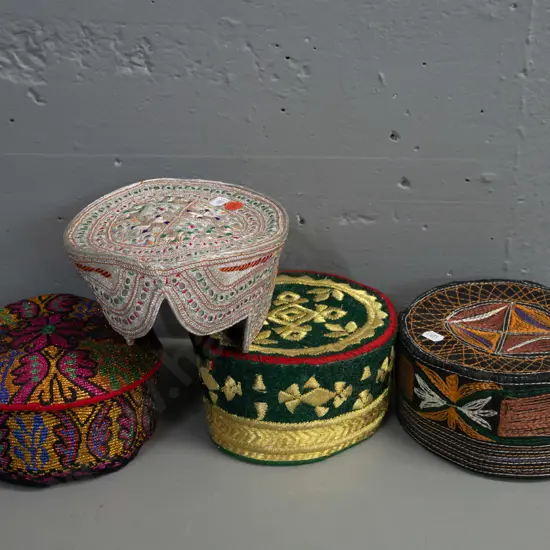 4 skullcaps from Pakistan and Afghanistan - multi colour woven fabric, metallic thread, mirrors etc