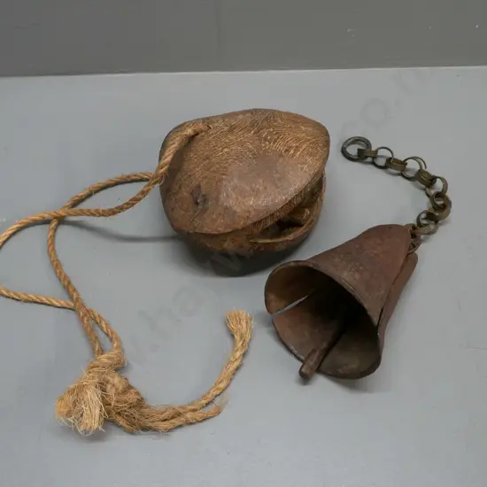 Somali wooden camel bell H-150 W-180 and a hand forged metal Sudanese cow bell with chain - pitting and discolouration