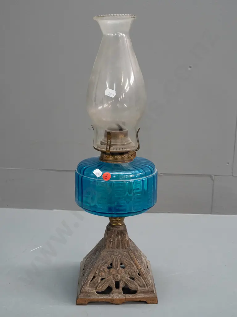 vintage kerosene lamp with blue glass tank, pierced cast base and clear chimney, knob marked Miller - small crack to Image 1++