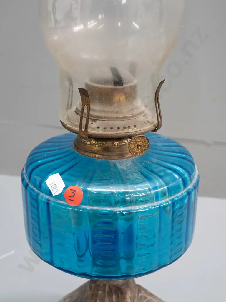 vintage kerosene lamp with blue glass tank, pierced cast base and clear chimney, knob marked Miller - small crack to Image 1++