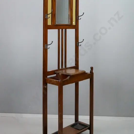 vintage oak hall stand with bevelled edge mirror, panels of textured yellow glass, 6 hooks, lift-lid compartment, drip