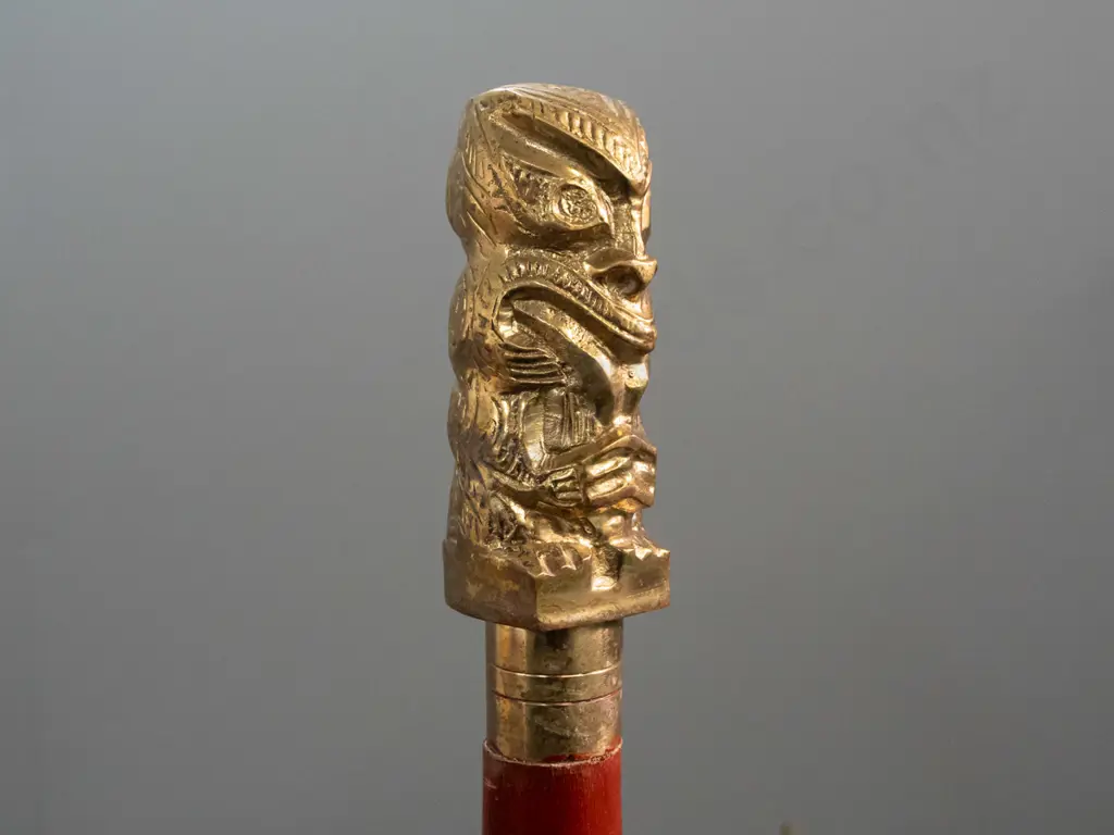 carved & painted timber walking stick with polished hollow cast brass Maori motif handle - some wear to paint L-950 Image 1++