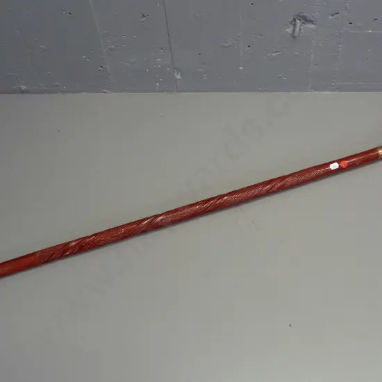 carved & painted timber walking stick with polished hollow cast brass Maori motif handle - some wear to paint L-950