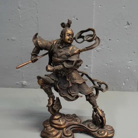 bronze figure of a Japanese warrior on swirling cloud base - with replacement painted wood staff or spear H-220 W-160