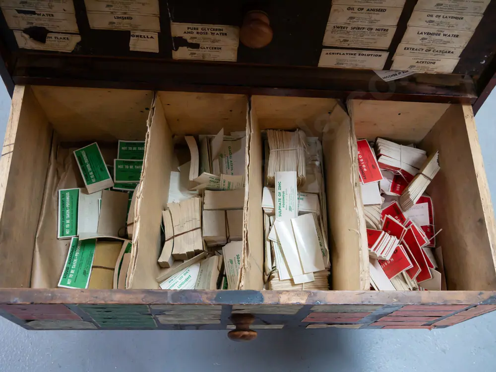 early colonial kahikatea and kauri 4-drawer chest used as pharmacy label storage, with contents, including example Image 1++