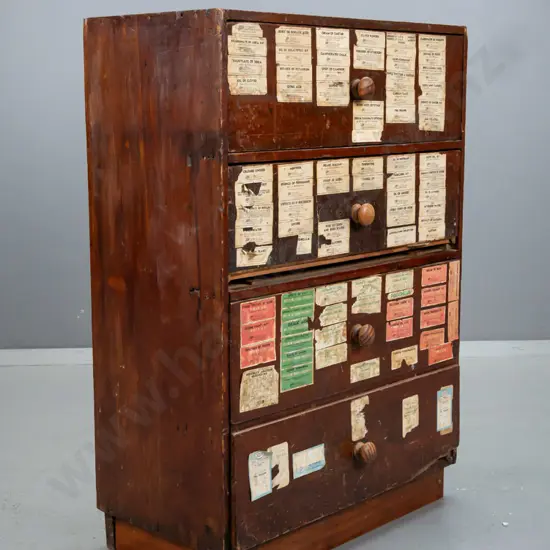 early colonial kahikatea and kauri 4-drawer chest used as pharmacy label storage, with contents, including example