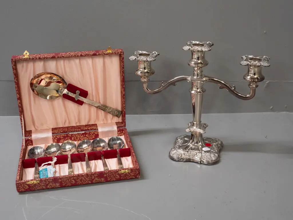cased Angora silver-plated set of 6 spoons and a serving spoon and an English plated 3-candle candelabra H-250 W-290 Image 1++