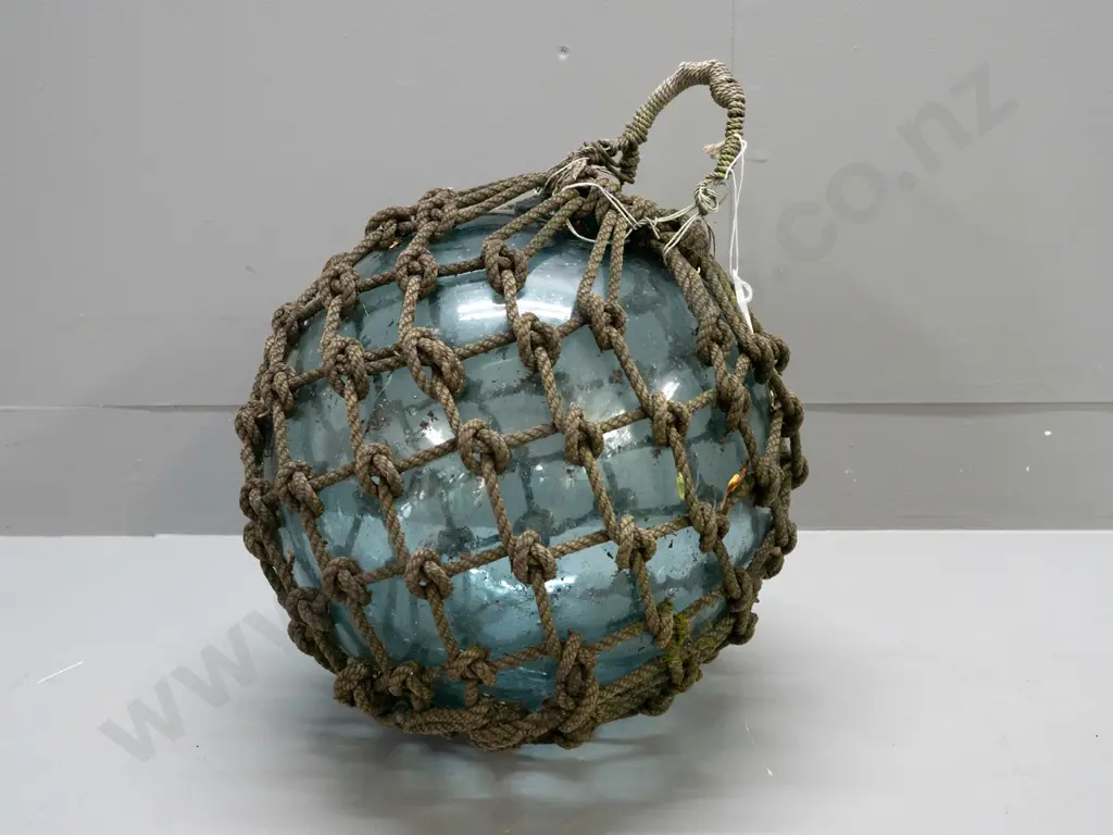 large blue glass fishing float in rope netting - approx. D-320 Image 1++