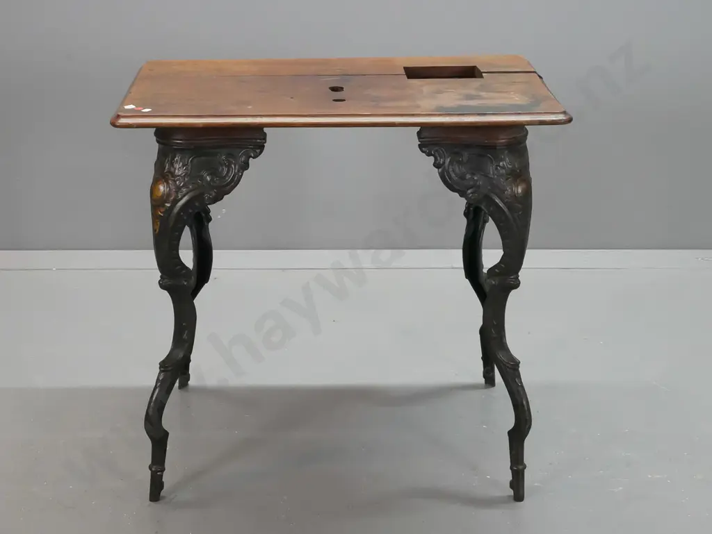 vintage work table with cast iron legs, oak top with cutouts and screw holes from removed apparatus - join in top is Image 1++
