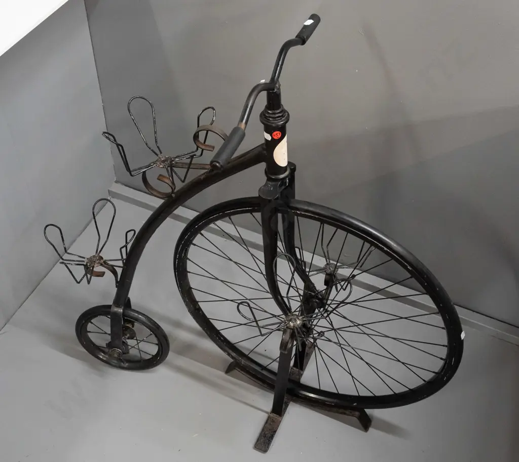 retro plant stand in the form of a penny farthing bicycle with rubber tyres, 4 plant holders, set on stand supporting Image 1++