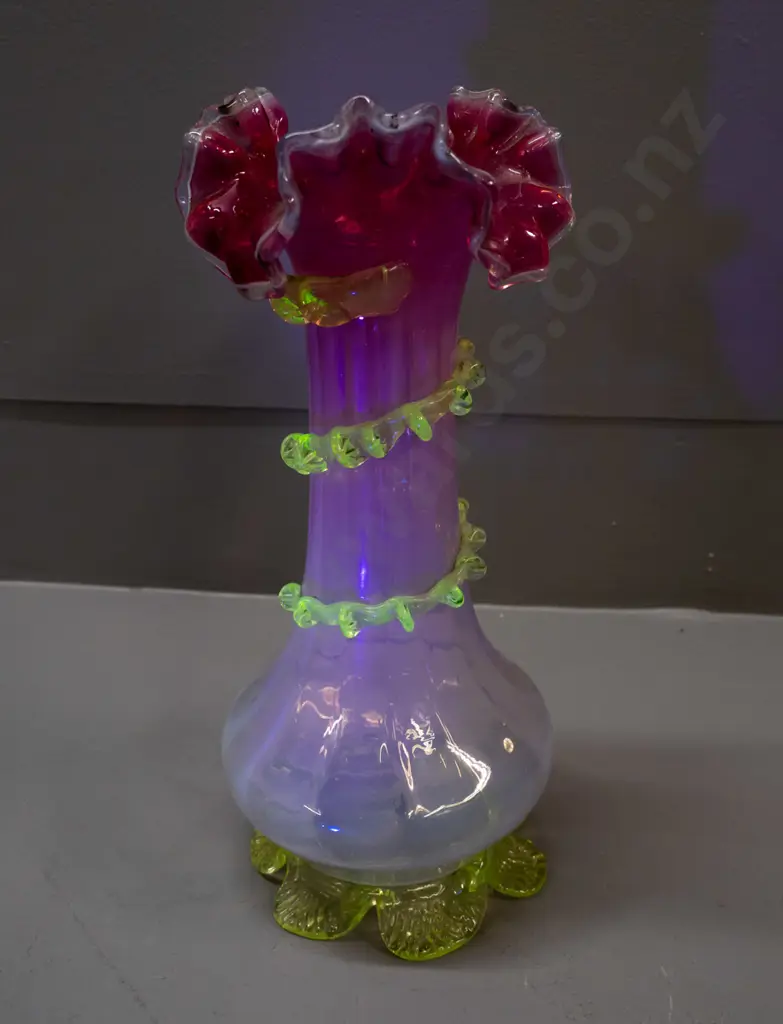 Victorian or nouveau style uranium vaseline glass vase fading to pink at top, with green uranium base and trailing band Image 1++