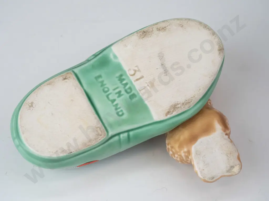 vintage (Sylvac?) puppy and slipper marked 31 and Made in England on bottom. H-60 L-155 Image 1++