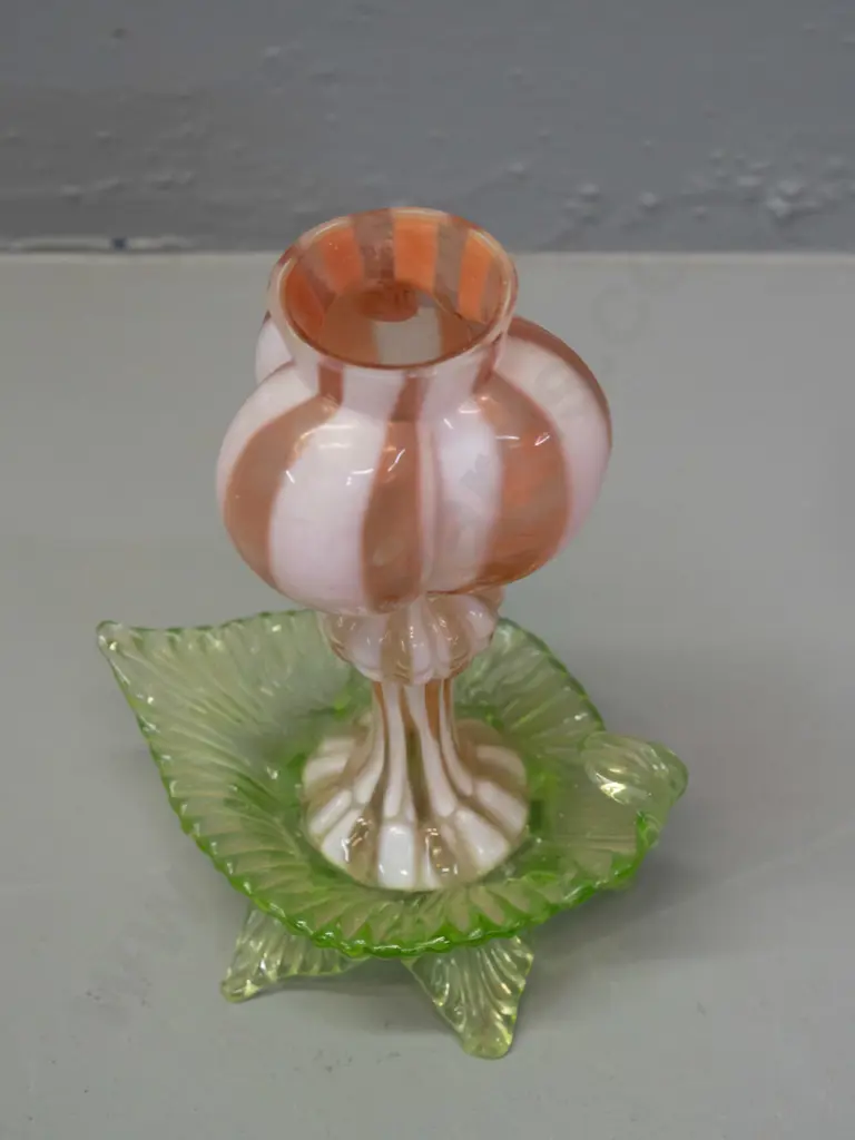 vintage uranium and pink glass vase with lobed top on green uranium 5-footed lead shaped base. 3 feet are chipped. H-180 Image 1++