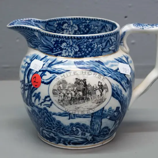 Shelley English blue & white transferware White Horse whisky jug with hunting motifs H-130 W-170