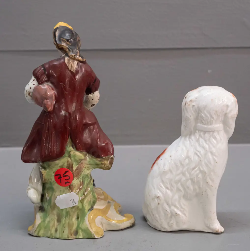antique seated musician with dog figure - note on base attributes to Chelsea Derby - and a small Staffordshire spaniel. Image 1++