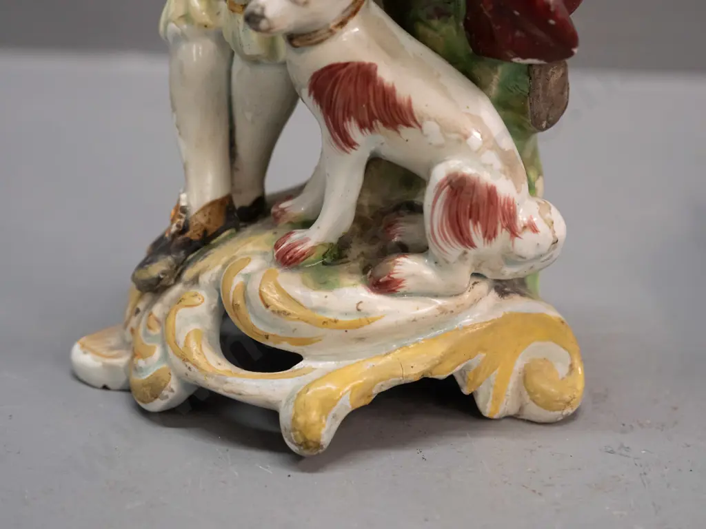 antique seated musician with dog figure - note on base attributes to Chelsea Derby - and a small Staffordshire spaniel. Image 1++