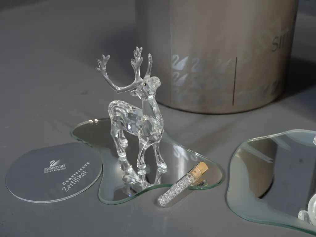 Swarovski crystal Christmas ornaments - reindeer and Santa, with 2 mirrored display platforms & tiny vial Image 1++