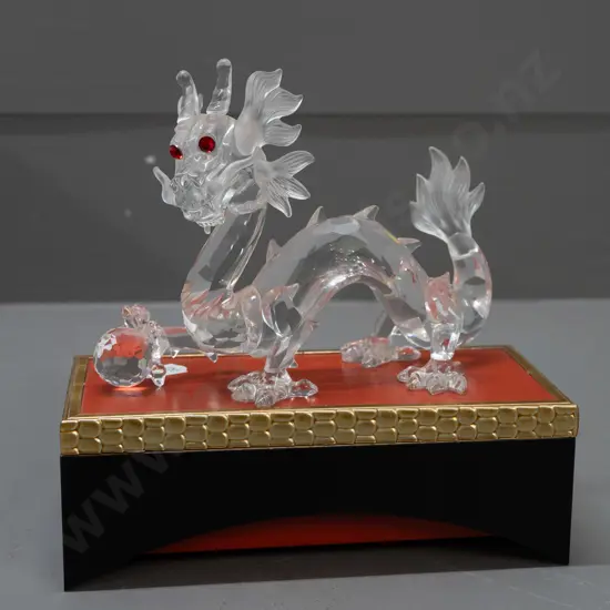 Swarovski crystal cased 1997 Fabulous Creatures series dragon figure with display stand, in original box. H-100 L-130
