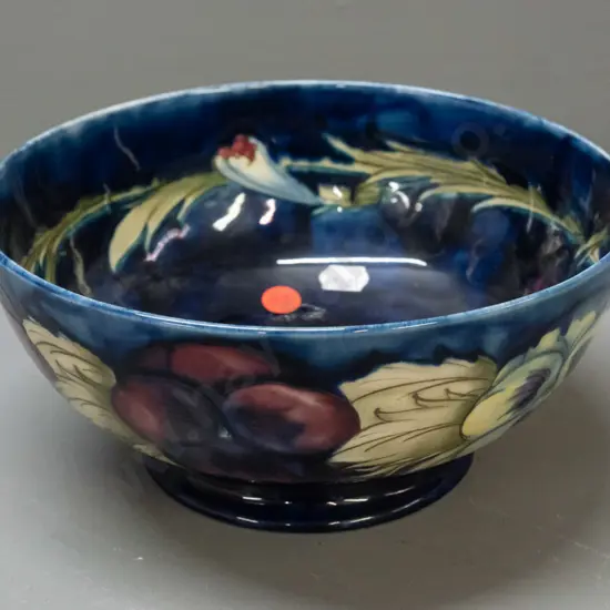 vintage Moorcroft tube lined pansy pattern bowl, green signature to base, decoration inside H-95 D-210