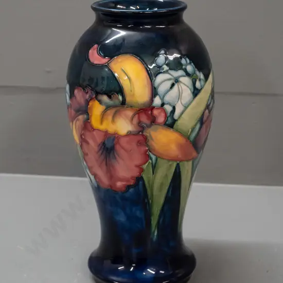 vintage Moorcroft tube lined iris pattern vase, green signature to base, Moorcroft Queen Mary label attached H-235 D-120