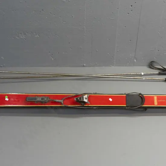 pair of vintage Austrian skis and poles - Hagan Kurier laminated skis with Tyrolia bindings, Tisdales NZ retail sticker,