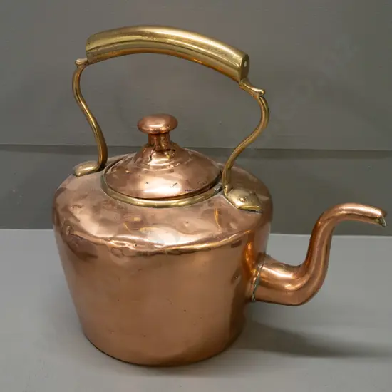 vintage copper kettle with brass handle and top rim - some dents and some splits to lid, oxidisation to inside H-290