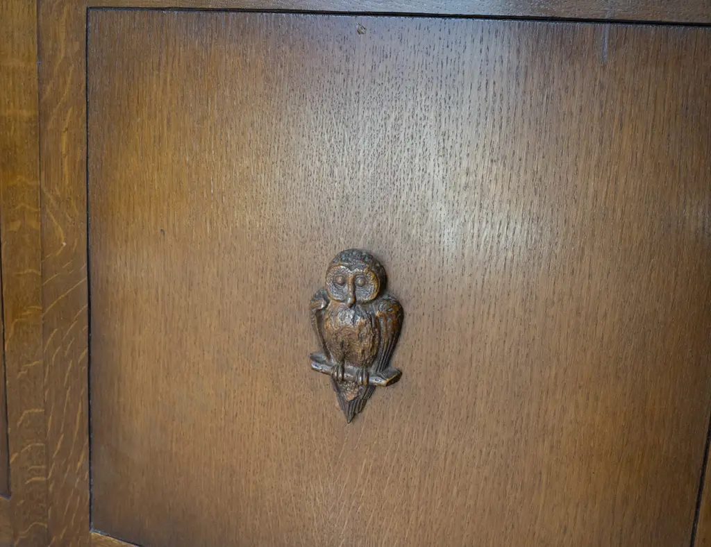 art deco oak display cabinet with 2 wooden astragal glazed doors, moulded applied owls to panels, 4 adjustable Image 1++