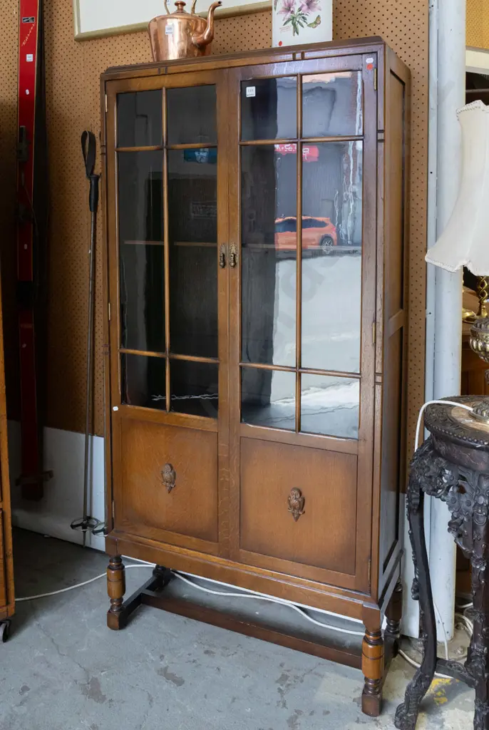 art deco oak display cabinet with 2 wooden astragal glazed doors, moulded applied owls to panels, 4 adjustable Image 1++