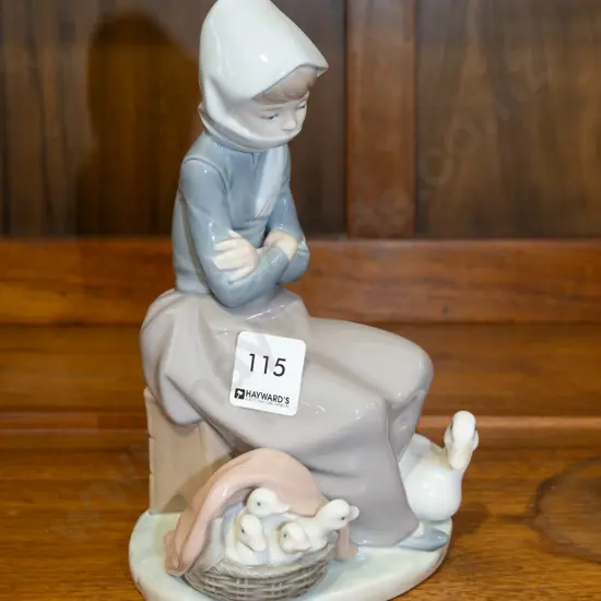 Lladro seated woman w/ ducks figurine H-210