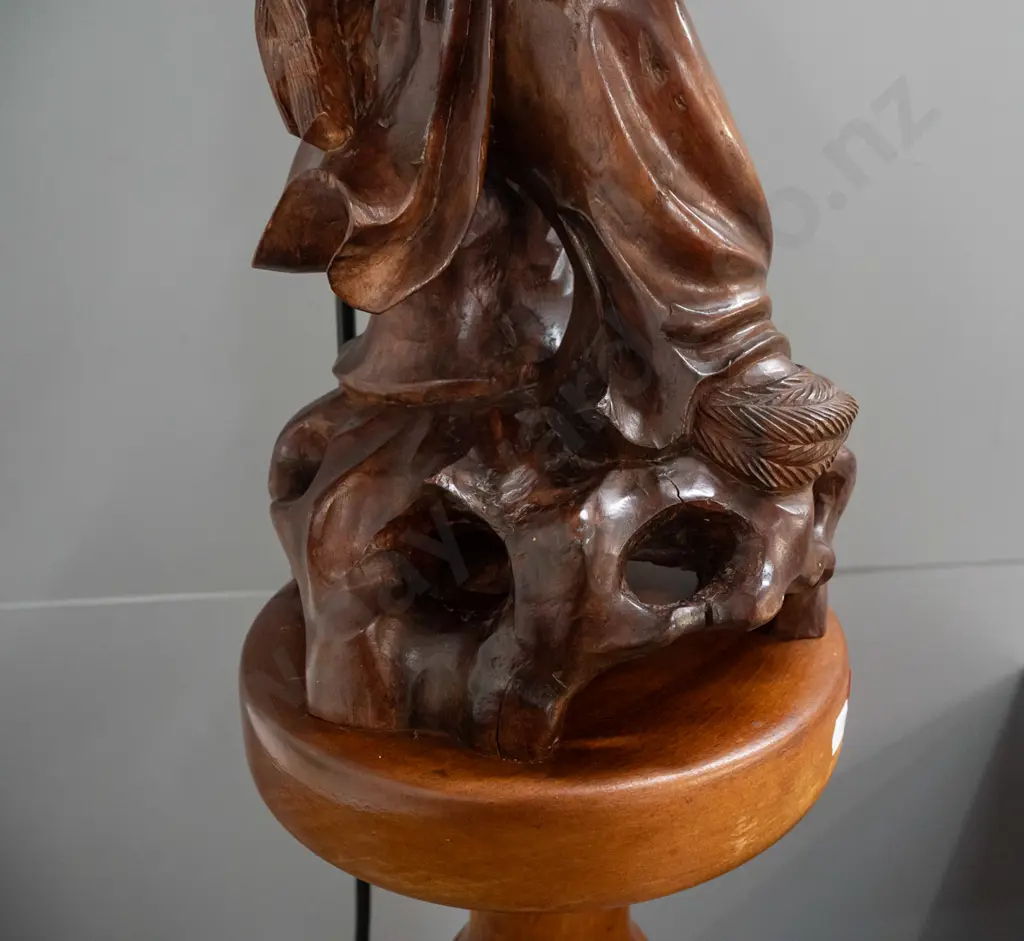 standard lamp made from Chinese carved hardwood figure attached to colonial turned kauri and rimu base, with electric Image 1++