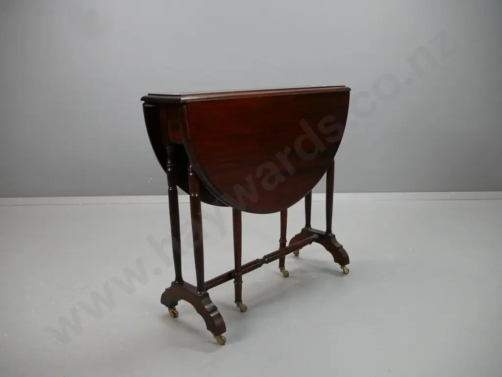 reproduction mahogany oval Sutherland gate leg table with turned legs, supports and stretcher base - Blakeleys Kaiapoi Image 1++