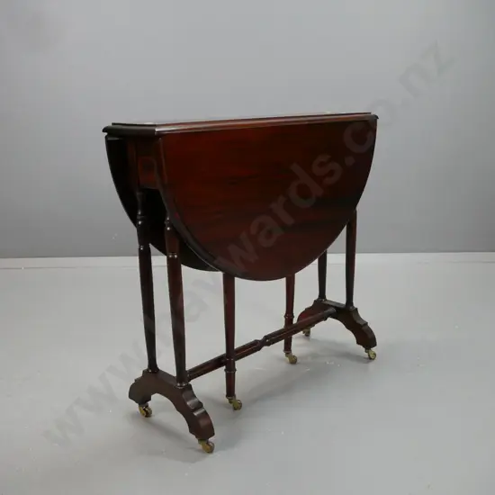 reproduction mahogany oval Sutherland gate leg table with turned legs, supports and stretcher base - Blakeleys Kaiapoi