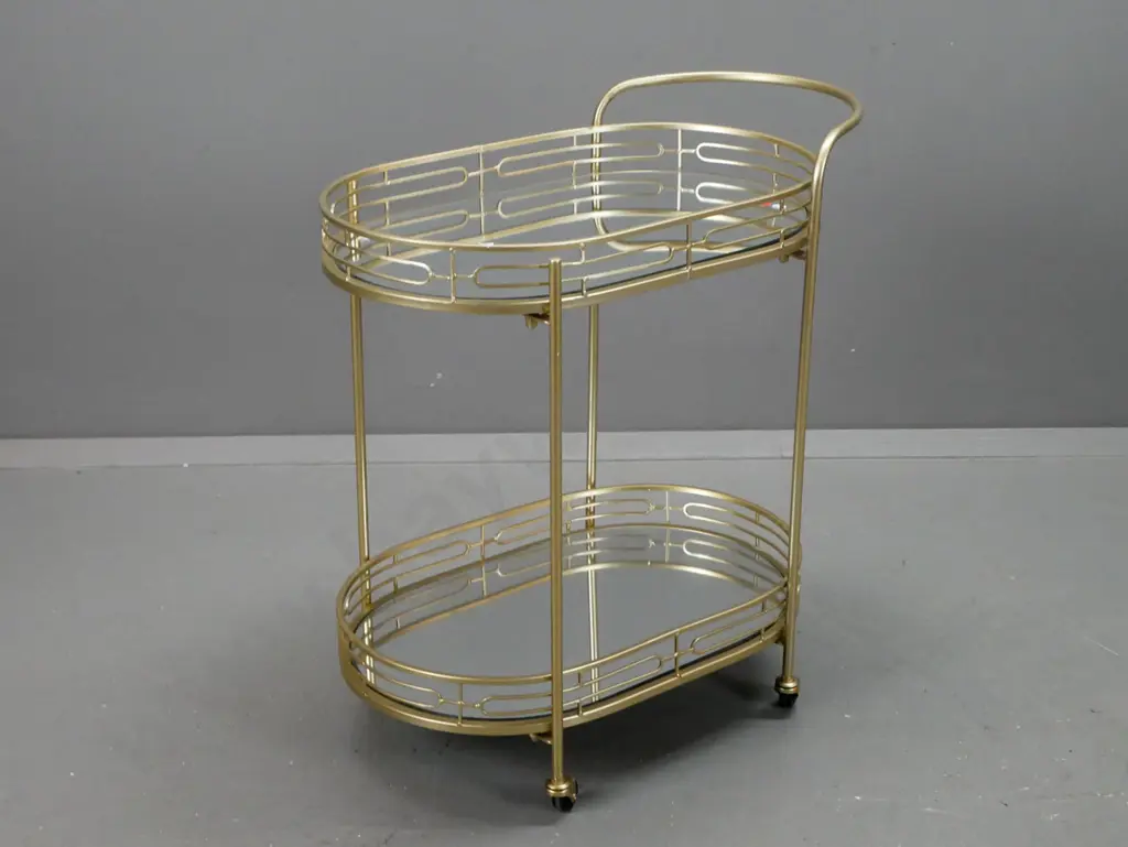 retro style tea or drinks trolley on plastic wheel casters, powder coated gold on metal frame, mirrored glass Image 1++