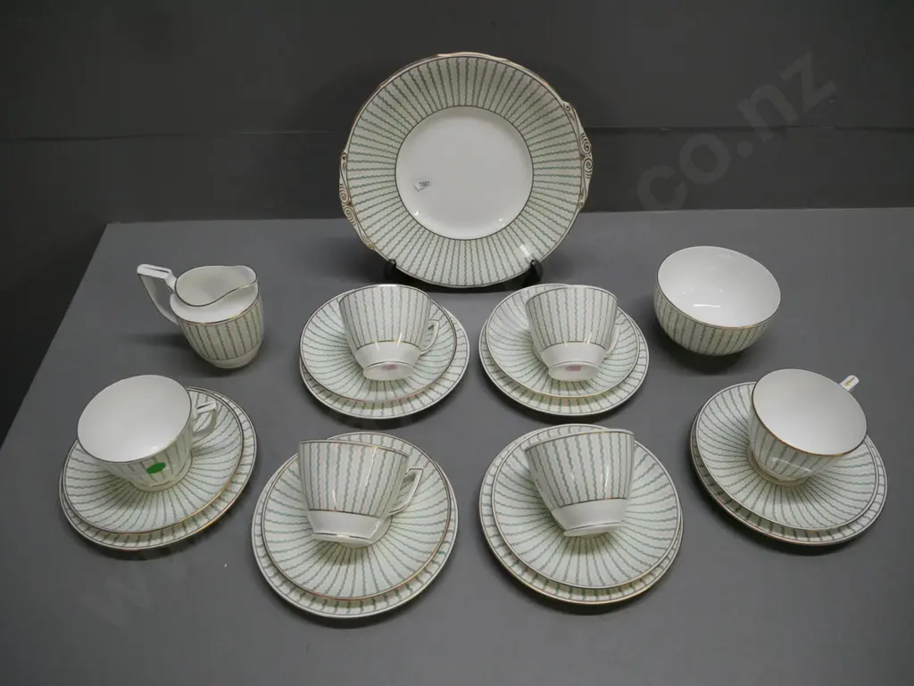 Mintons 21-piece Art Deco green & pink zigzag tea set: 6x trios, sandwich plate cream & sugar Image 1++