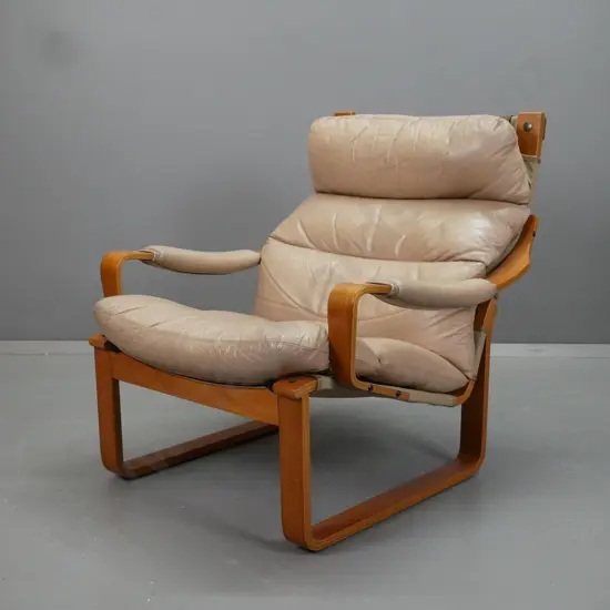 mid-century laminated bent wood teak and mixed timbers lounge chair with leather seat, back and arm pads, has new canvas