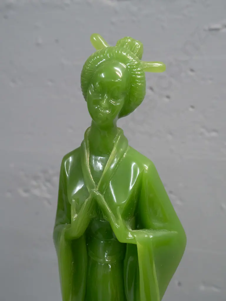 retro green faux jade composite figures - Japanese woman with "Marble Art Production NZ" label on base and smaller male Image 1++