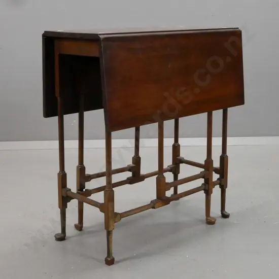 Edwardian vintage mahogany drop-side table with turned supports & stretcher base on pad feet