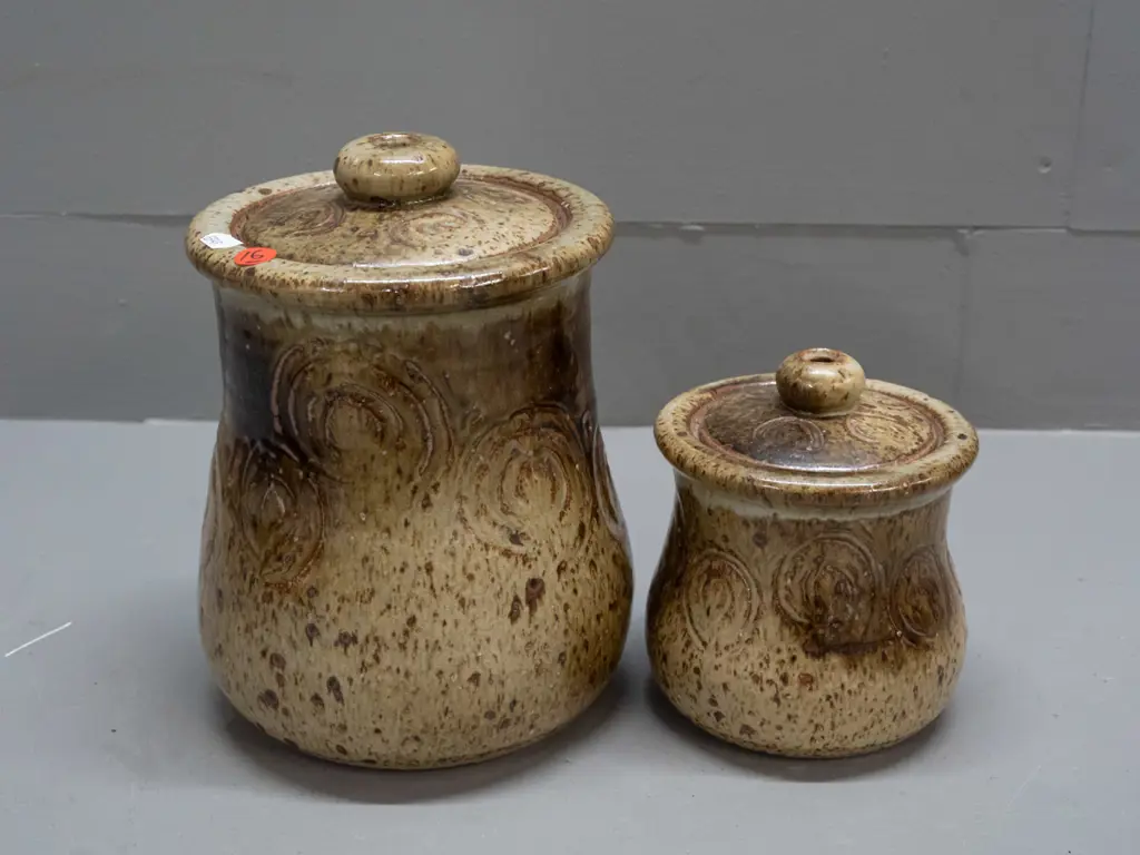 2 Lawrence Ewing New Zealand studio pottery lidded containers with incised scrolling decoration - larger is H-210 D-150 Image 1++