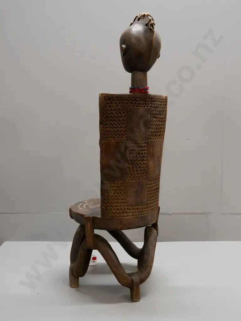 African carved wooden ceremonial child's chair with applied hide and inlay metal studs, bead necklace etc - Kaguru tribe Image 1++