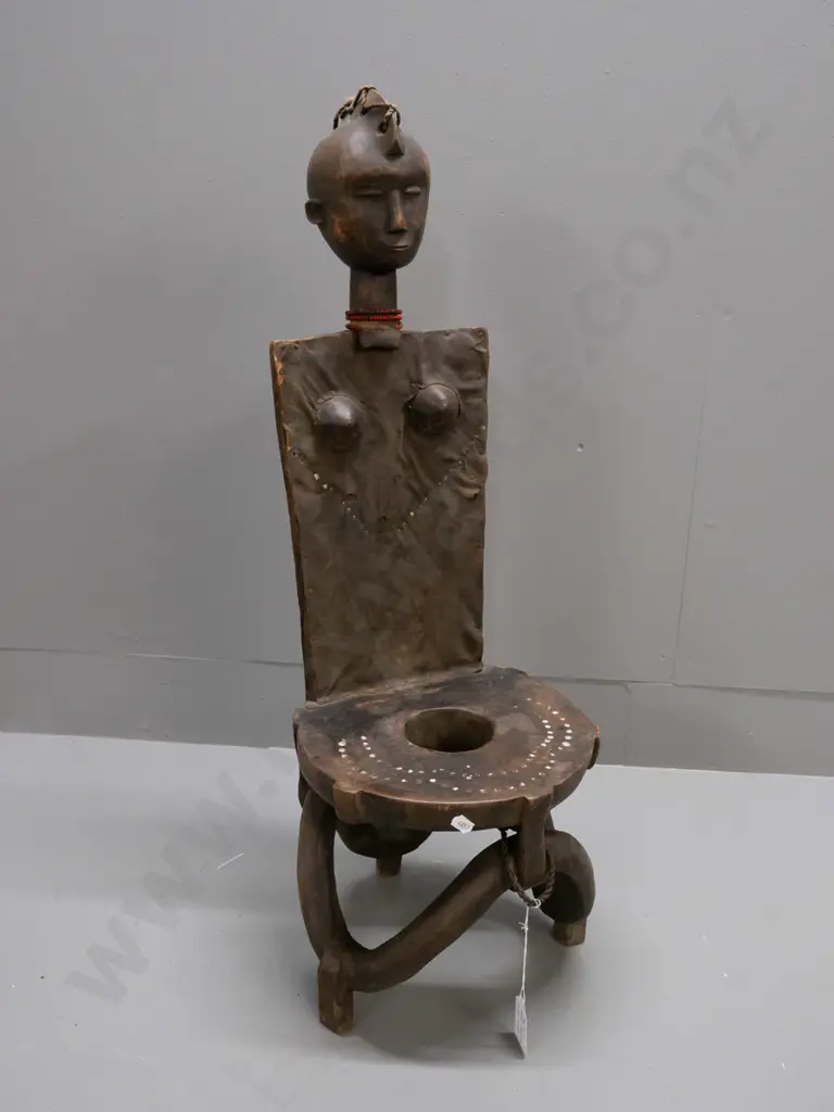 African carved wooden ceremonial child's chair with applied hide and inlay metal studs, bead necklace etc - Kaguru tribe Image 1++