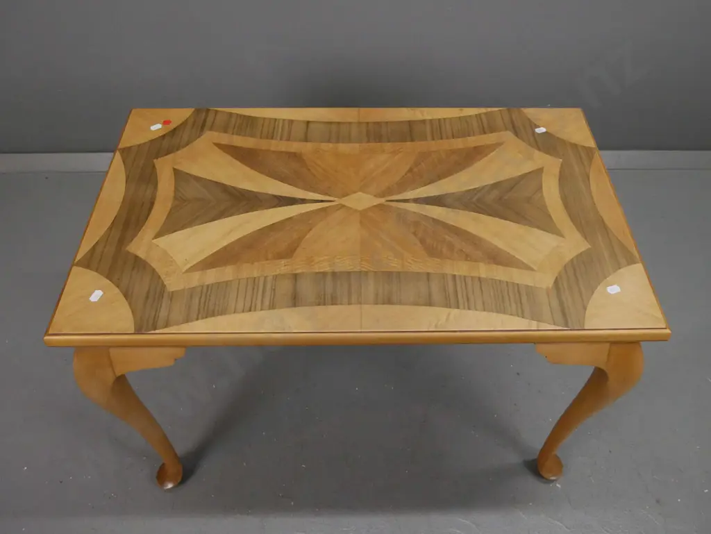 kauri cab-leg occasional table with inlaid walnut, rewa-rewa and other mixed timbers top. Small veneer repair in top Image 1++