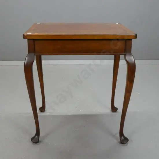 small mahogany and beech side table on cabriole legs. Scratching to top, impact damage to one corner.