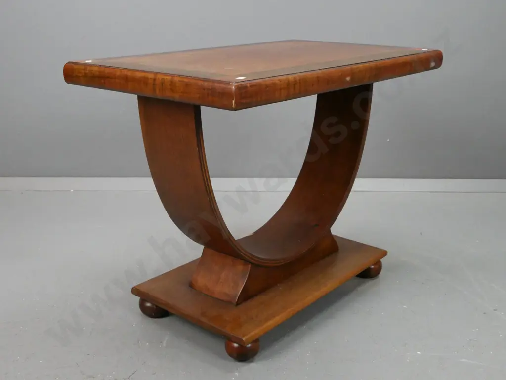 vintage art deco walnut and mahogany table with veneered cross-banded top, laminate hoop base on platform with bun feet Image 1++